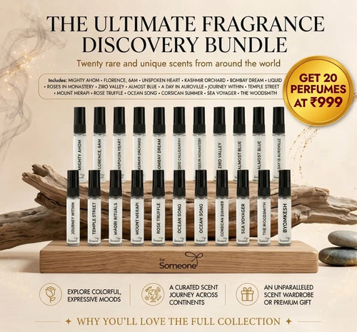 Fragrance discovery bundle with various perfume bottles on a wooden stand, featuring promotional text.