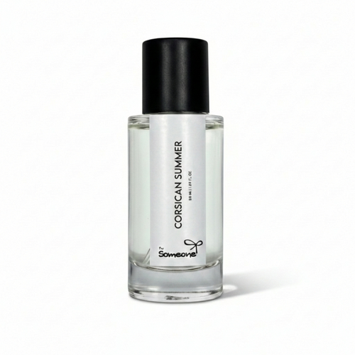 Clear bottle with black cap labeled 'Corsican Summer' on a white background